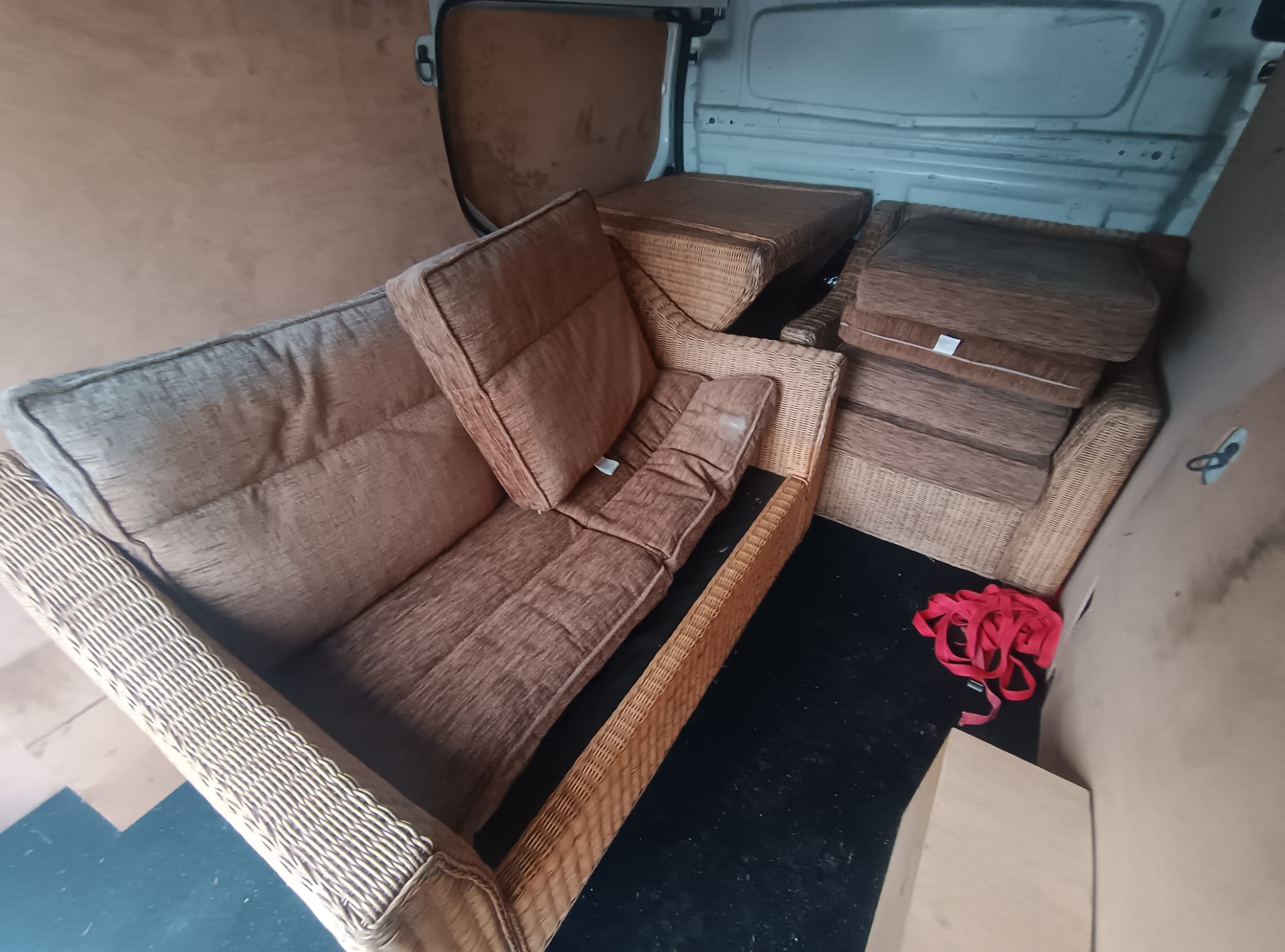 Furniture delivery load secured in van